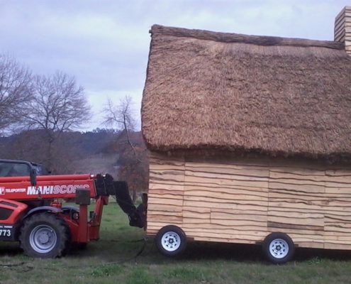 Telehandler pulling scenery on a film set